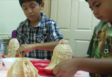 Mop Top Summer Campers make volcanos